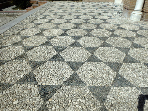 Spanish style of stone walkways and stone courtyards..